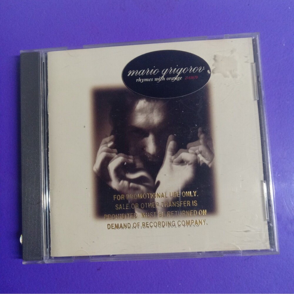 Rhymes With Orange by Mario Grigorov PROMO CD